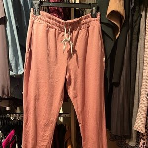 Vuori mid-rise performance jogger size small terra cotta color